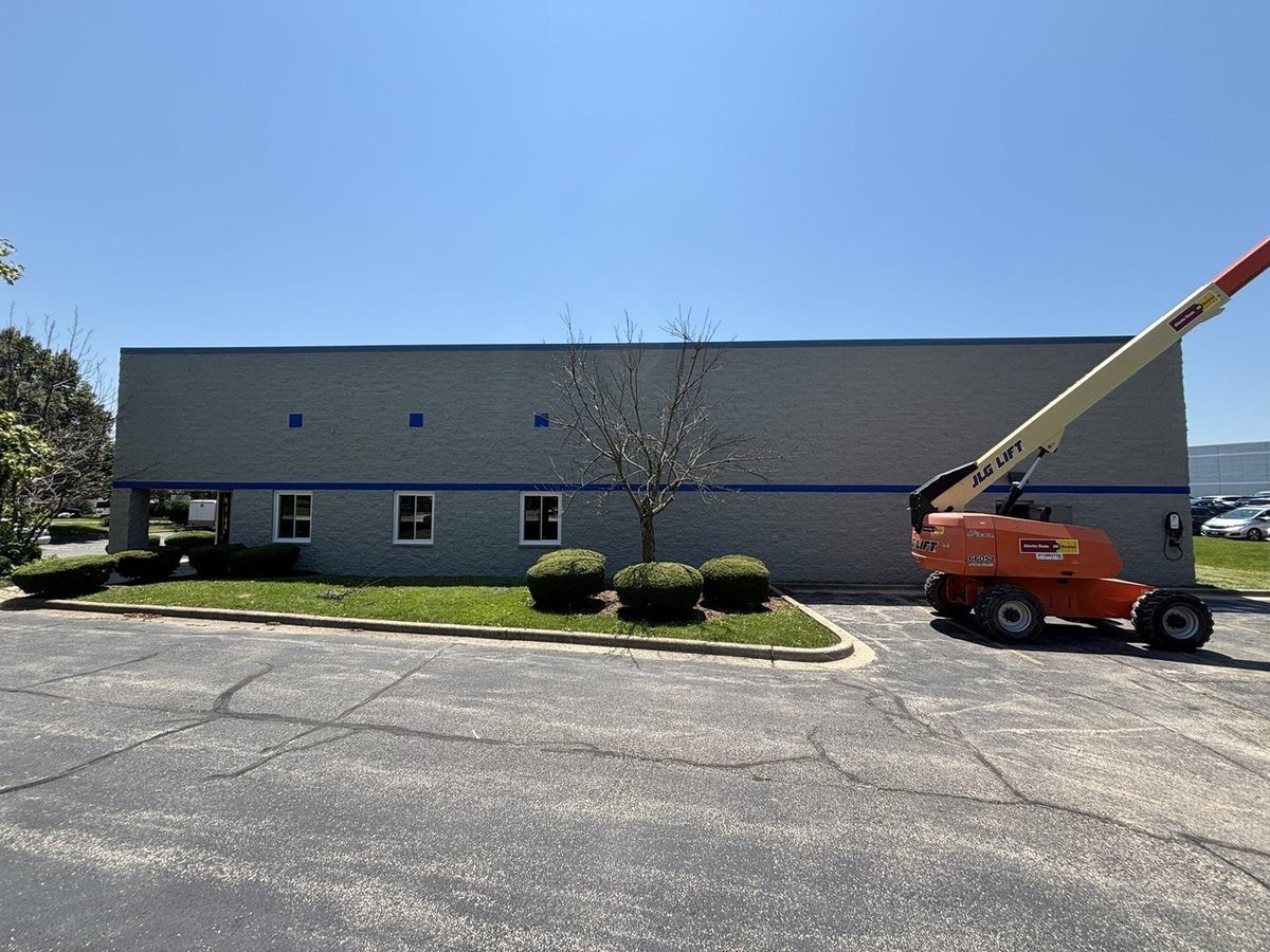 Commercial building exterior after masonry restoration and painting, Chicagoland