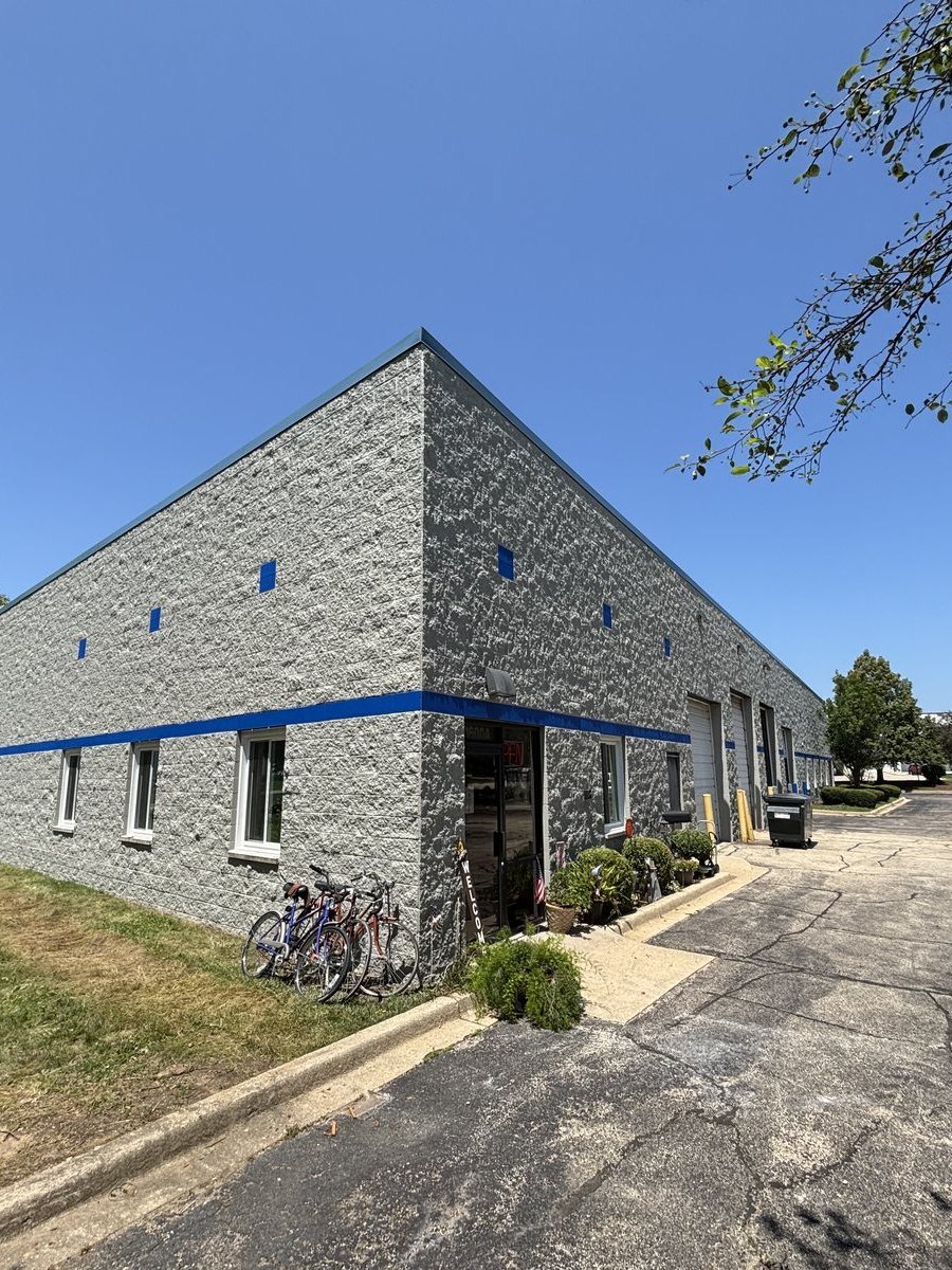 Commercial building after masonry restoration and repainting