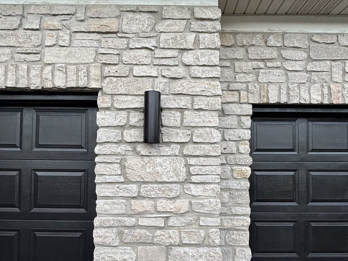 Cultured stone masonry detail on a residential exterior, Algonquin IL