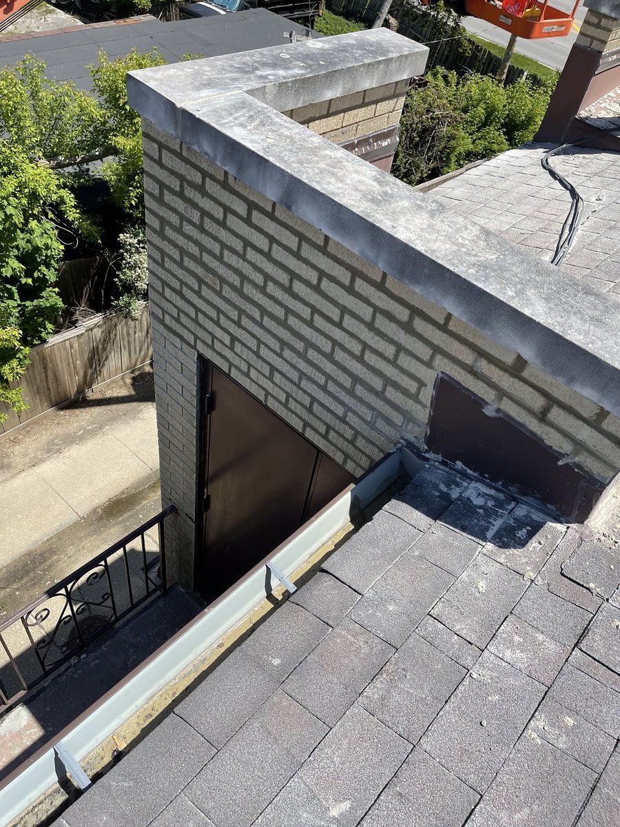 Wall cap after grinding and tuckpointing, joints clean and uniform